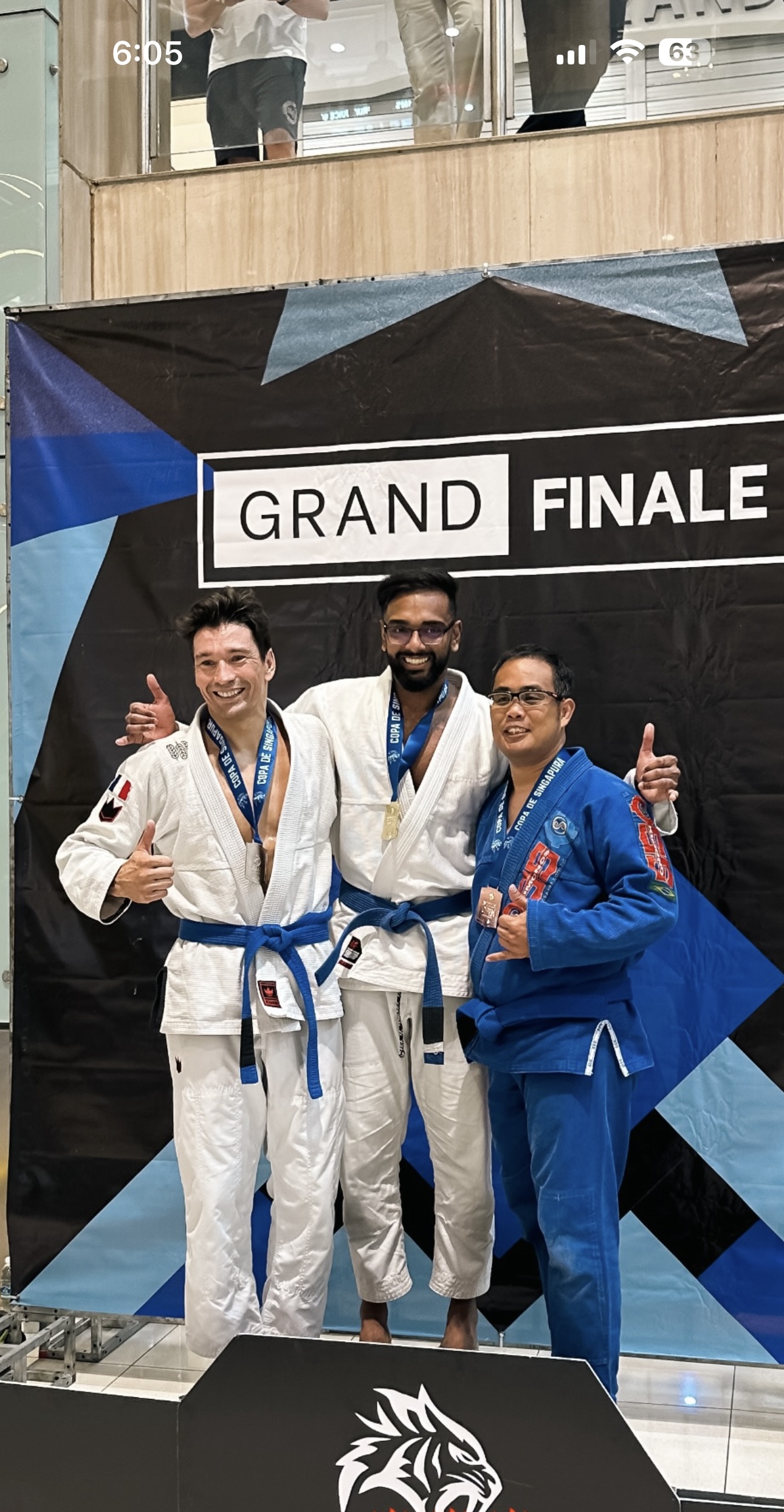 Copa de Singapura medal podium photo